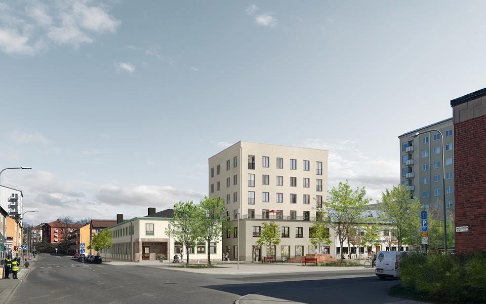 Ett torg med träd och byggnader omkring det. 